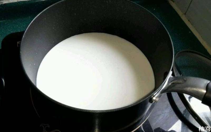 暖奶器可以把奶的温度提高