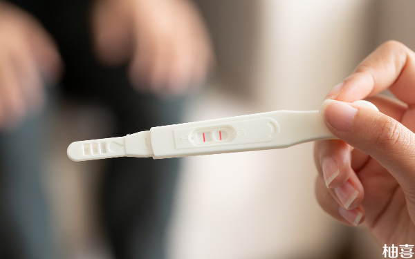 试管鲜胚移植第十天试纸验尿显示双杠红色是怀孕吗？